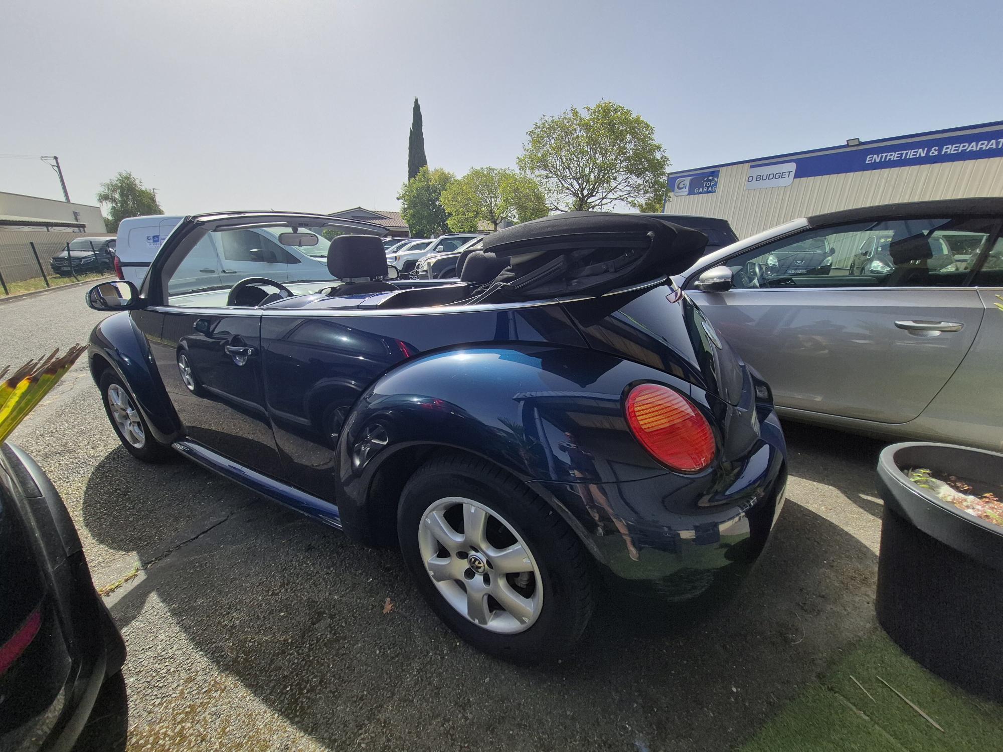 VOLKSWAGEN NEW BEETLE CABRIOLET 1.9 TDI 105 CARAT, CLIMATISATION,VITRES ELECS, RADIO CD,JANTES ALUS, REPRISE POSS, GARANTIE 3 MOIS - photo 4